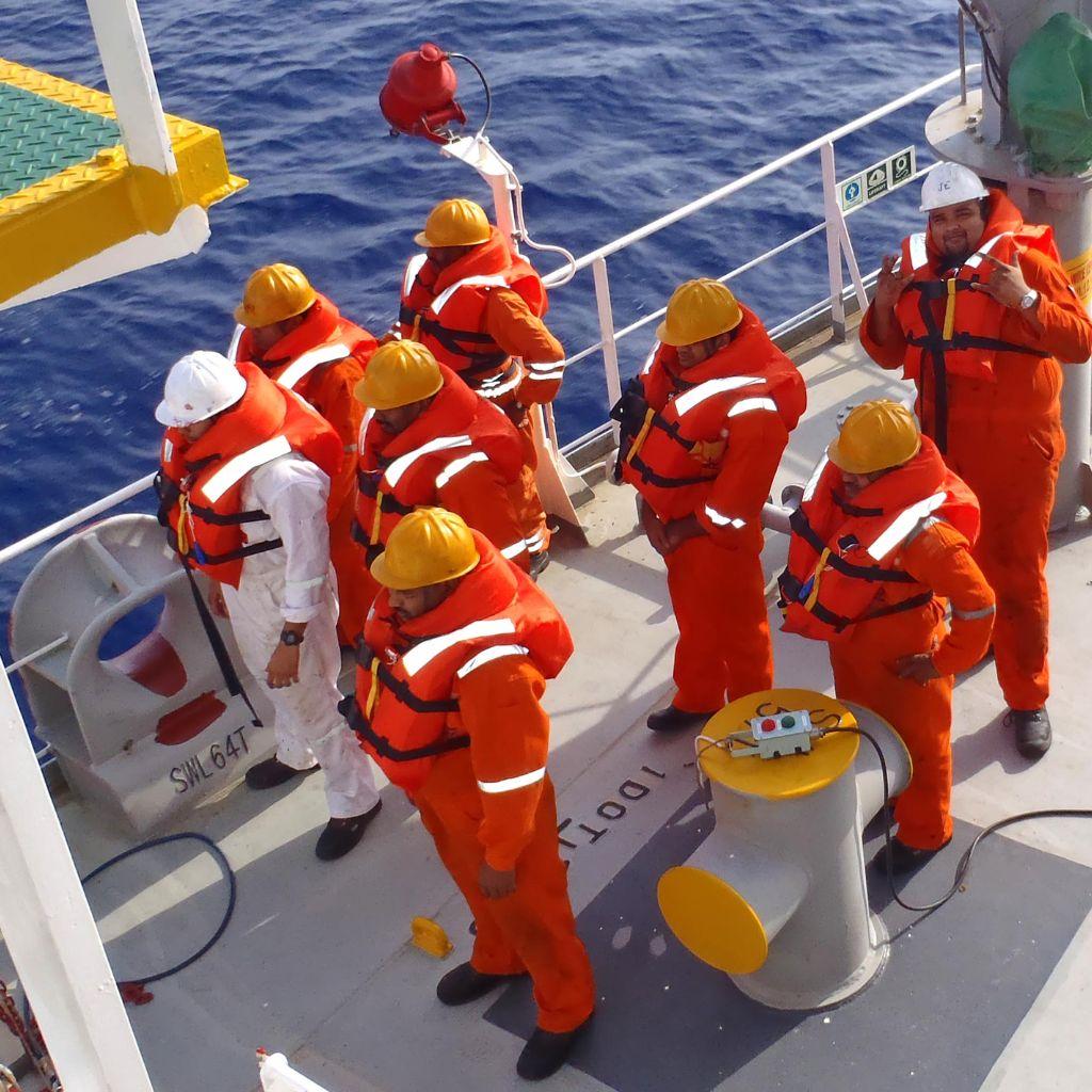 Deck crew in protective clothing